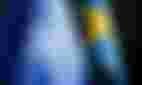 Close-up of the flags of Sweden and NATO.